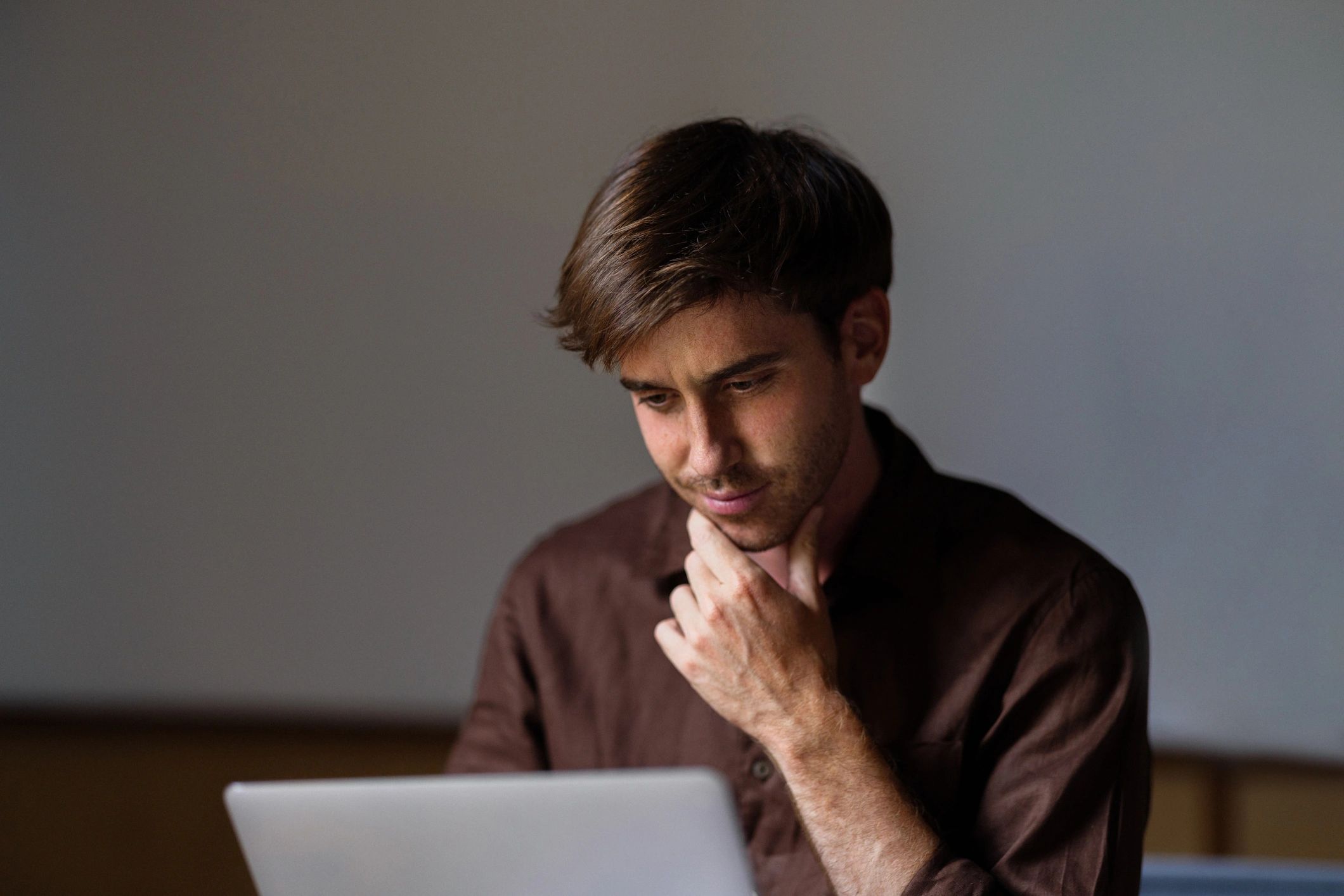 Customer using a laptop for remote technical support